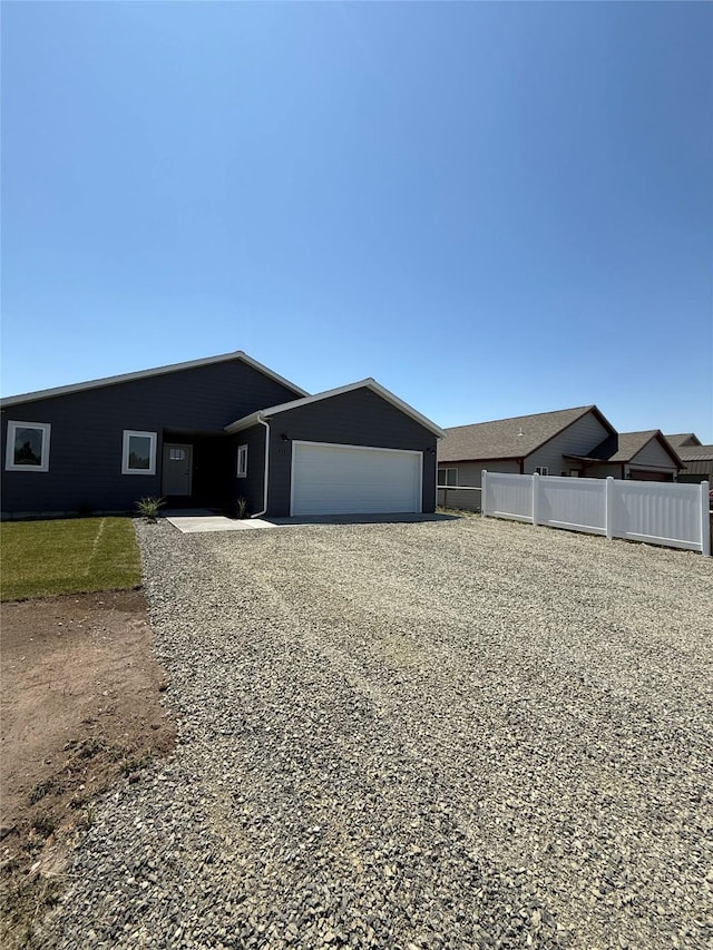 417 I St, Townsend, MT 59644 - view of front of property featuring a garage and driveway