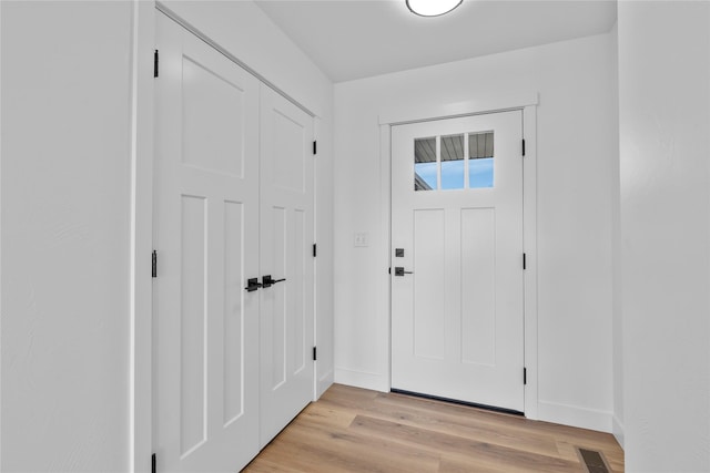 417 I St, Townsend, MT 59644 - foyer with baseboards and light wood finished floors