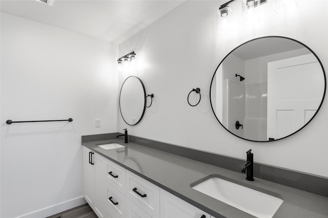 417 I St, Townsend, MT 59644 - bathroom with double vanity and baseboards