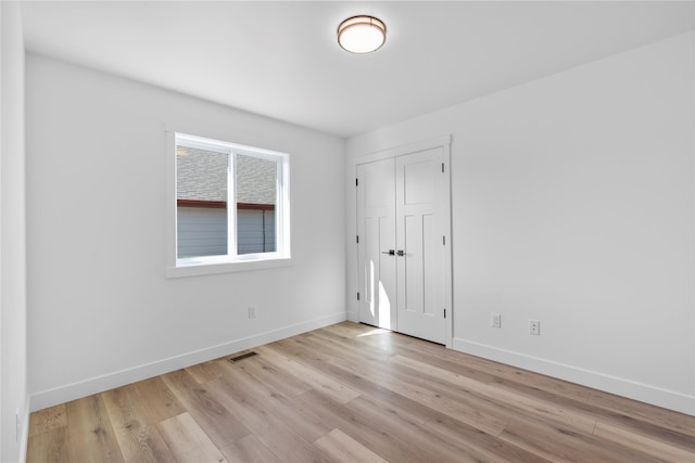417 I St, Townsend, MT 59644 - unfurnished bedroom with light wood-style floors and a closet