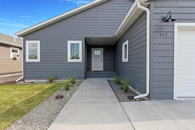 417 I St, Townsend, MT 59644 - entrance to property featuring an attached garage and a yard