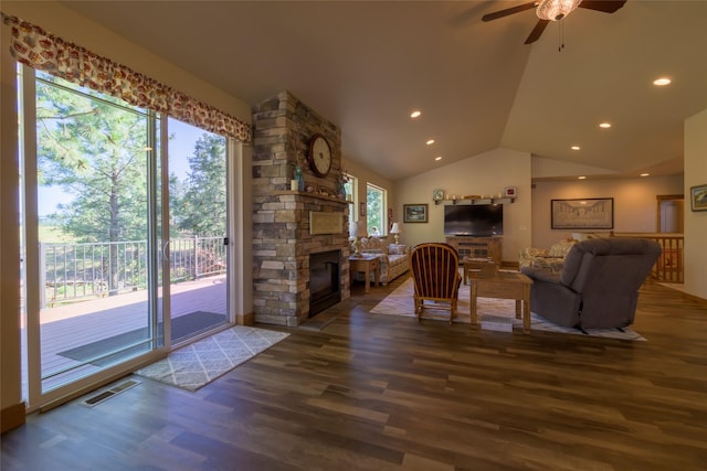 10487 Coulter Pine St, Lolo, MT 59847 - living area with wood finished floors, a fireplace, vaulted ceiling, ceiling fan, and recessed lighting