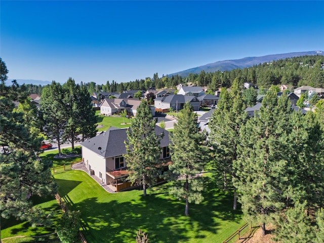 10487 Coulter Pine St, Lolo, MT 59847 - aerial perspective of suburban area with a mountain backdrop