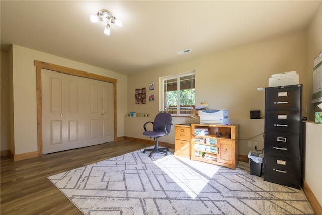 10487 Coulter Pine St, Lolo, MT 59847 - office featuring wood finished floors and baseboards