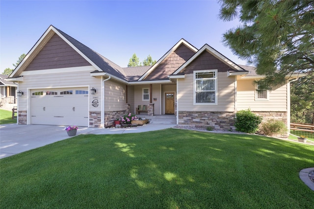 10487 Coulter Pine St, Lolo, MT 59847 - craftsman-style house with an attached garage, a front lawn, concrete driveway, and stone siding