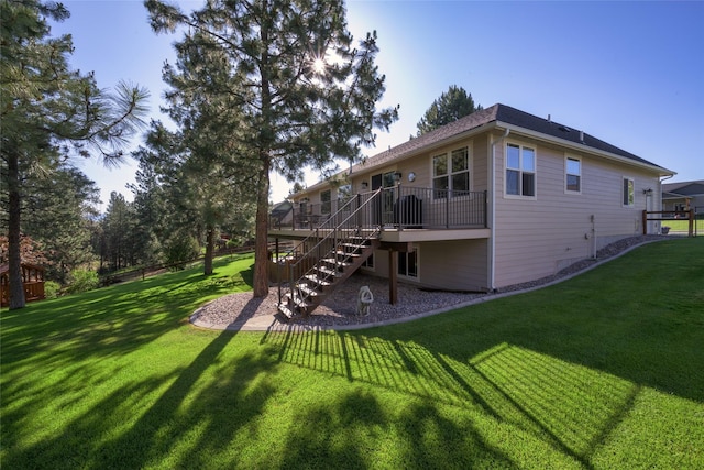 10487 Coulter Pine St, Lolo, MT 59847 - back of property with stairway and a deck
