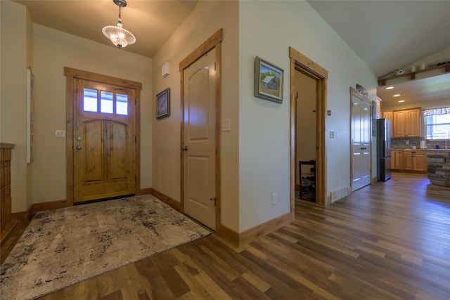 10487 Coulter Pine St, Lolo, MT 59847 - entryway featuring dark wood-style flooring and recessed lighting