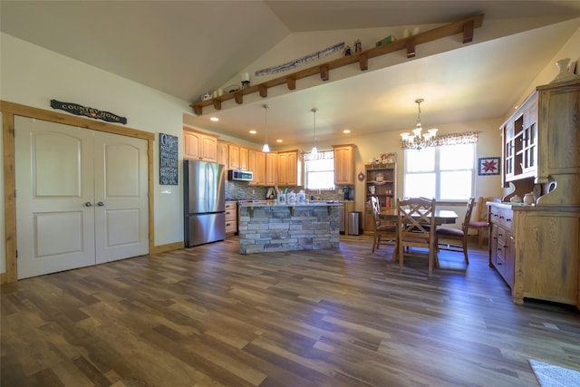 10487 Coulter Pine St, Lolo, MT 59847 - kitchen with stainless steel appliances, a chandelier, tasteful backsplash, dark wood-style flooring, and recessed lighting