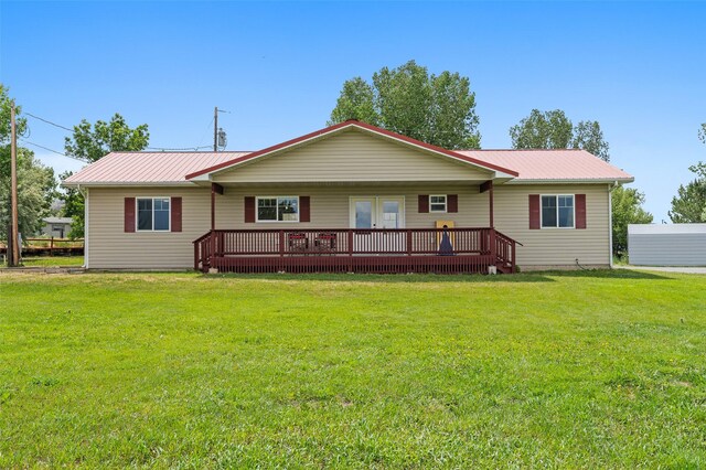 211 Pony St, Toston, MT 59643 - view of front facade featuring a front yard, a metal roof, and a wooden deck
