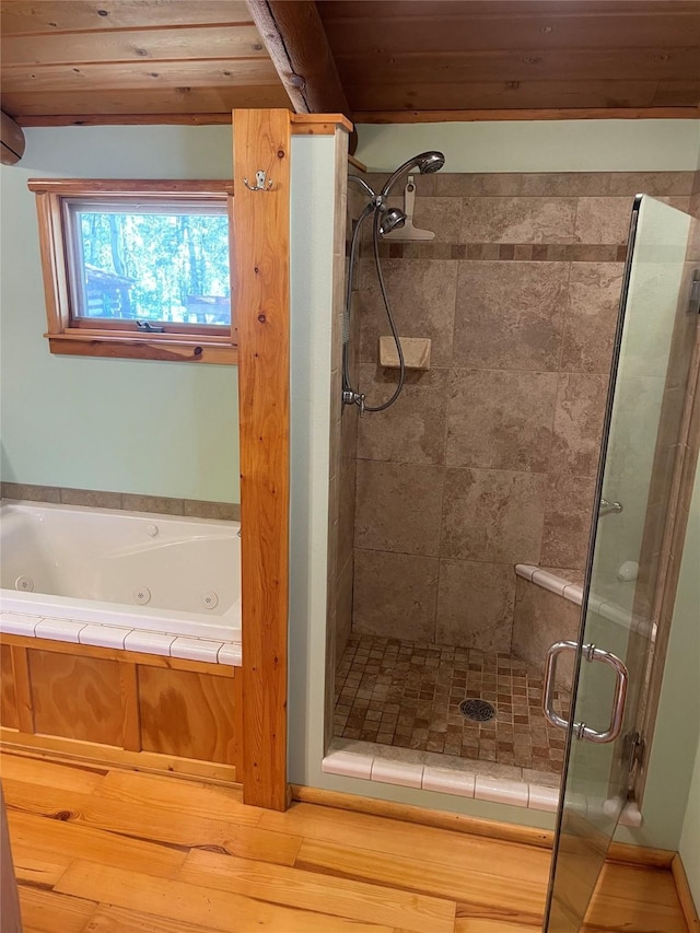 22550 Hill Rd, Clinton, MT 59825 - bathroom featuring a shower stall and a jetted tub