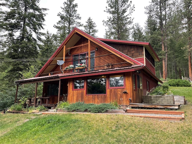 22550 Hill Rd, Clinton, MT 59825 - view of front facade featuring a front lawn