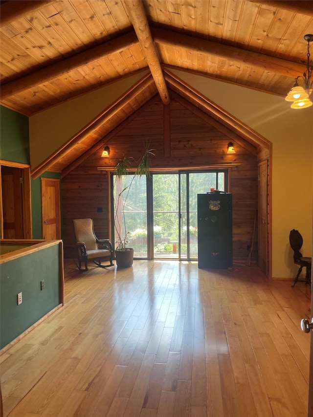 22550 Hill Rd, Clinton, MT 59825 - living area with wood walls, wood ceiling, and hardwood / wood-style flooring
