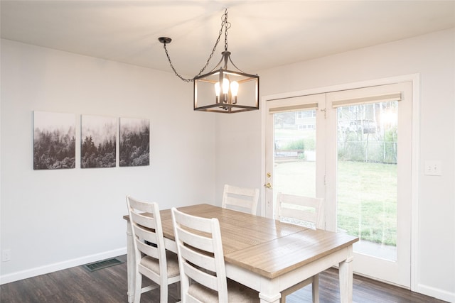 51 Konley Dr, Kalispell, MT 59901 - dining room with a chandelier, healthy amount of natural light, and dark wood-style flooring