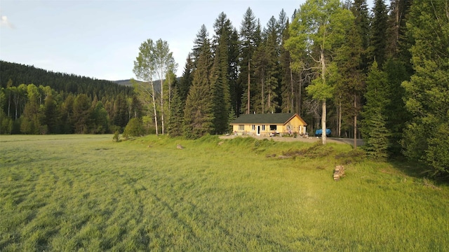 27687 Yaak River Rd, Troy, MT 59935 - view of yard featuring a wooded view