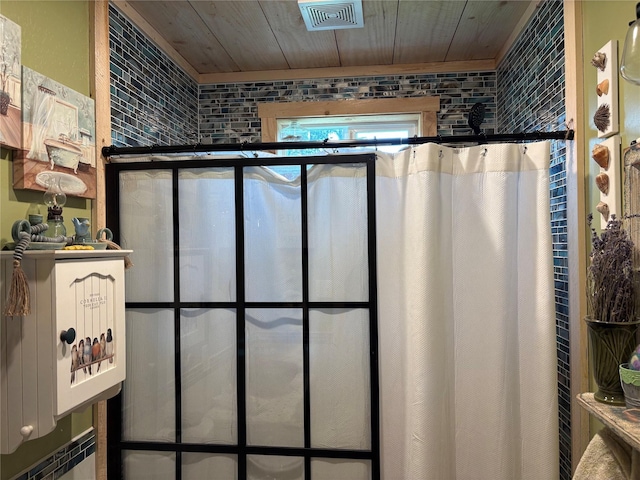 27687 Yaak River Rd, Troy, MT 59935 - full bathroom with wood ceiling and curtained shower