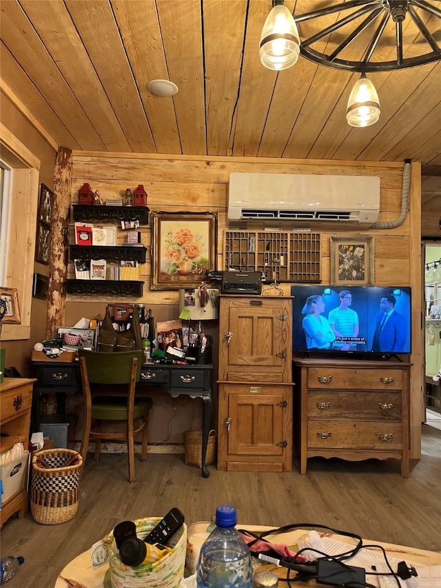 27687 Yaak River Rd, Troy, MT 59935 - office with a wall mounted air conditioner, wood ceiling, wood finished floors, and wooden walls