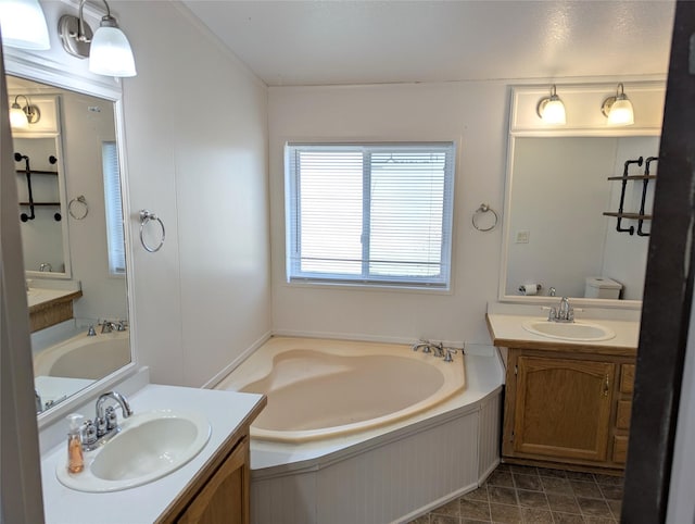 47 Merlin Dr, Bozeman, MT 59718 - bathroom featuring a bath and two vanities