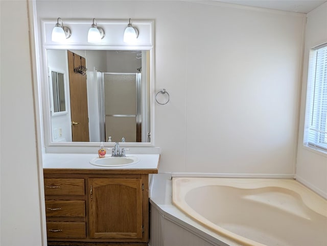 47 Merlin Dr, Bozeman, MT 59718 - full bathroom featuring a stall shower, vanity, and a bath