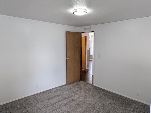 47 Merlin Dr, Bozeman, MT 59718 - carpeted spare room with baseboards and a textured ceiling