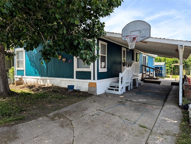 47 Merlin Dr, Bozeman, MT 59718 - view of side of property featuring a carport