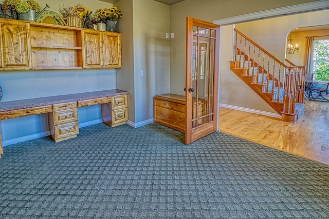 396 Wild Moose Springs Rd, Corvallis, MT 59828 - unfurnished office with dark carpet, built in study area, and french doors
