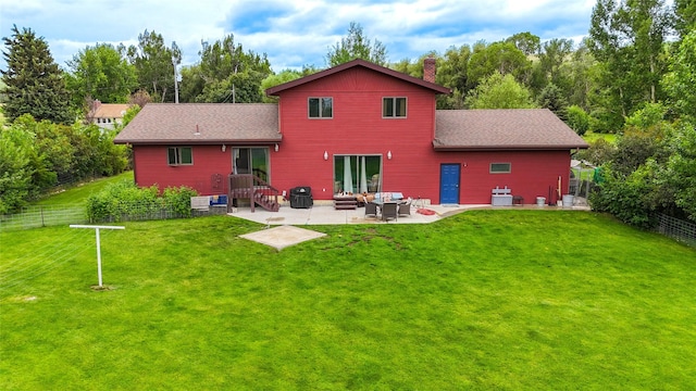 952 Chestnut Ave, Highwood, MT 59450 - rear view of property featuring a patio, a chimney, outdoor lounge area, and a shingled roof