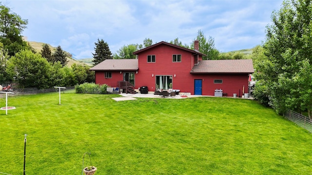 952 Chestnut Ave, Highwood, MT 59450 - rear view of property featuring a patio area and a chimney