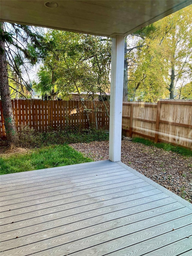 777 Aspen Grove St, Whitefish, MT 59937 - wooden terrace with a fenced backyard