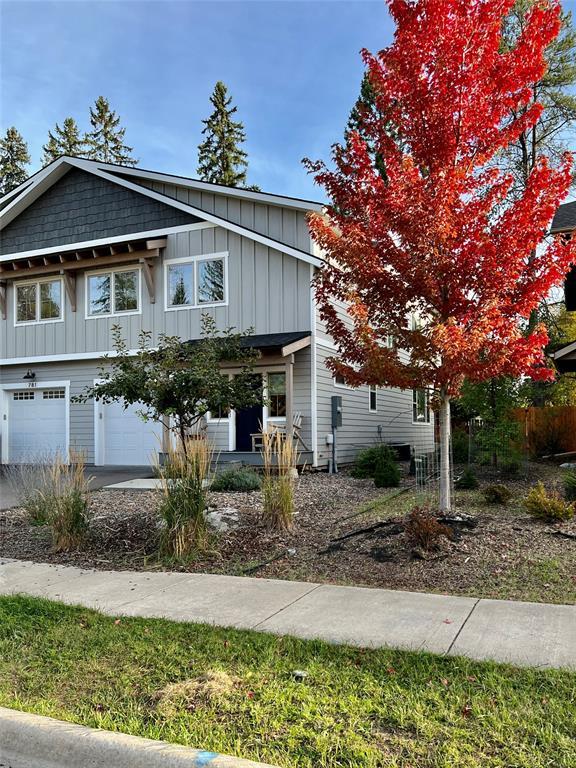 777 Aspen Grove St, Whitefish, MT 59937 - view of front of house featuring board and batten siding and an attached garage