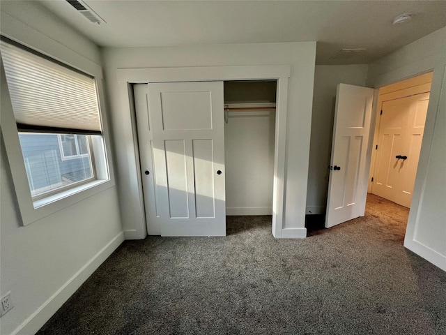 777 Aspen Grove St, Whitefish, MT 59937 - unfurnished bedroom featuring carpet flooring and a closet