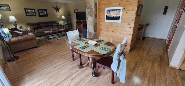 9 Cross Ln, Plains, MT 59859 - dining area with light wood-style floors and a fireplace