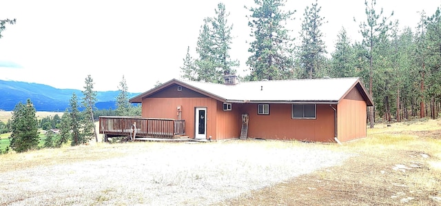 9 Cross Ln, Plains, MT 59859 - single story home featuring a deck with mountain view