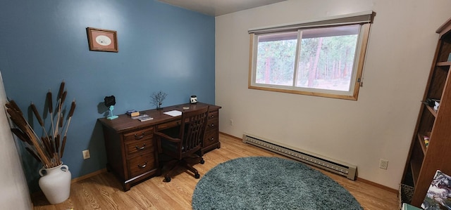 9 Cross Ln, Plains, MT 59859 - home office featuring a baseboard heating unit and light wood-style flooring