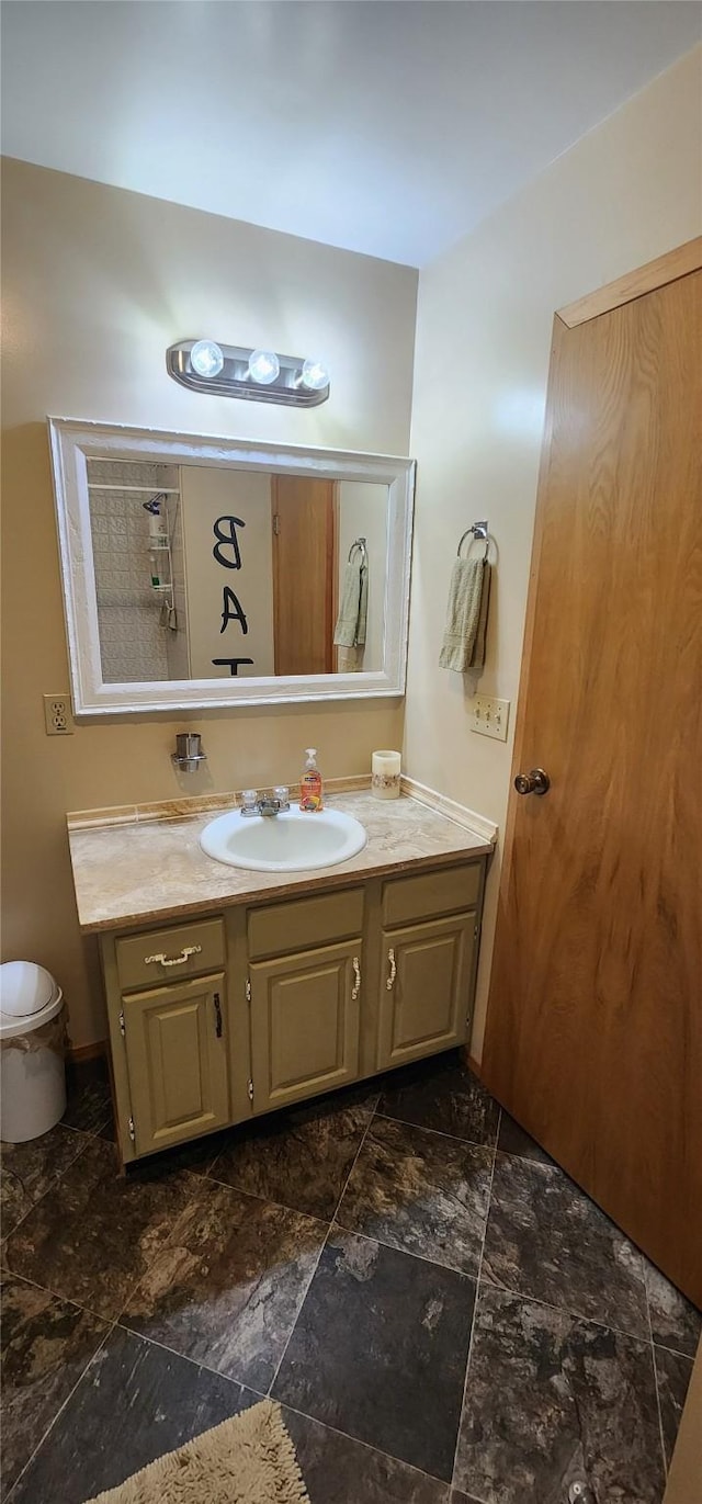 9 Cross Ln, Plains, MT 59859 - bathroom featuring vanity and stone finish flooring