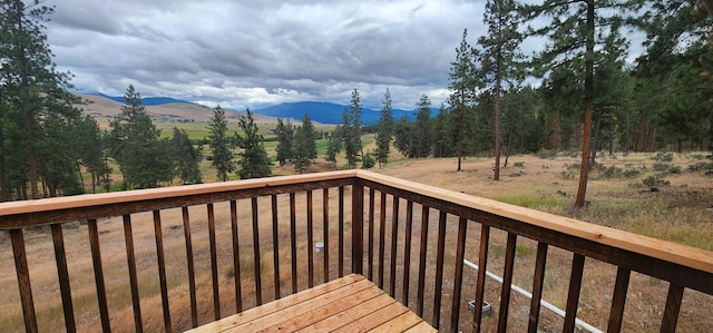 9 Cross Ln, Plains, MT 59859 - wooden terrace featuring a mountain view