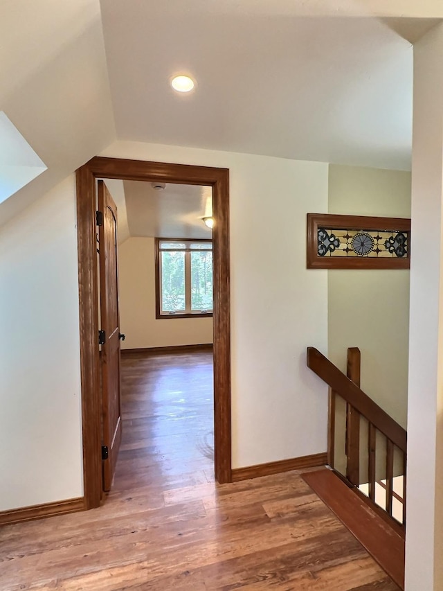 251 Elk Trl, Whitefish, MT 59937 - hallway featuring wood finished floors, lofted ceiling, and recessed lighting