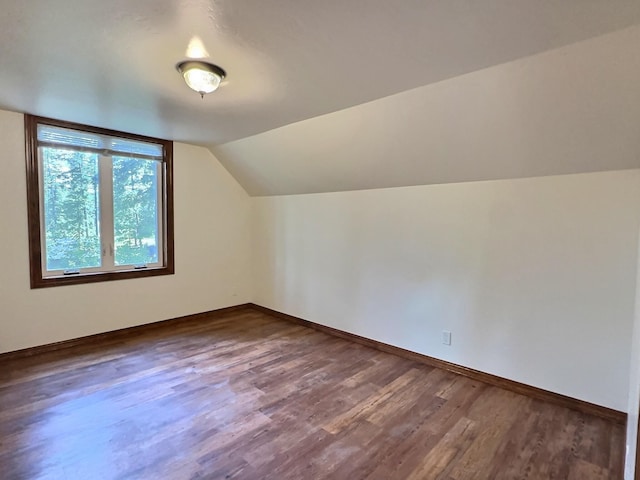 251 Elk Trl, Whitefish, MT 59937 - additional living space featuring wood finished floors and vaulted ceiling