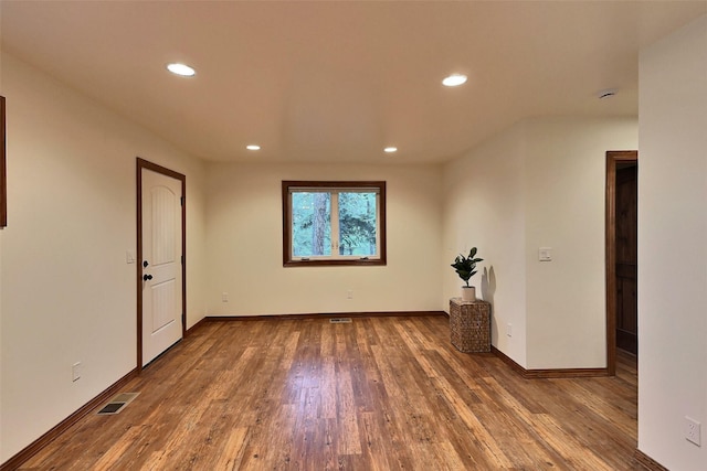 251 Elk Trl, Whitefish, MT 59937 - unfurnished room featuring recessed lighting and wood finished floors