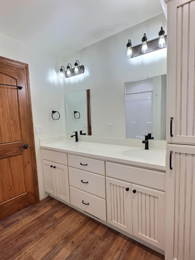 251 Elk Trl, Whitefish, MT 59937 - full bath with double vanity and wood finished floors