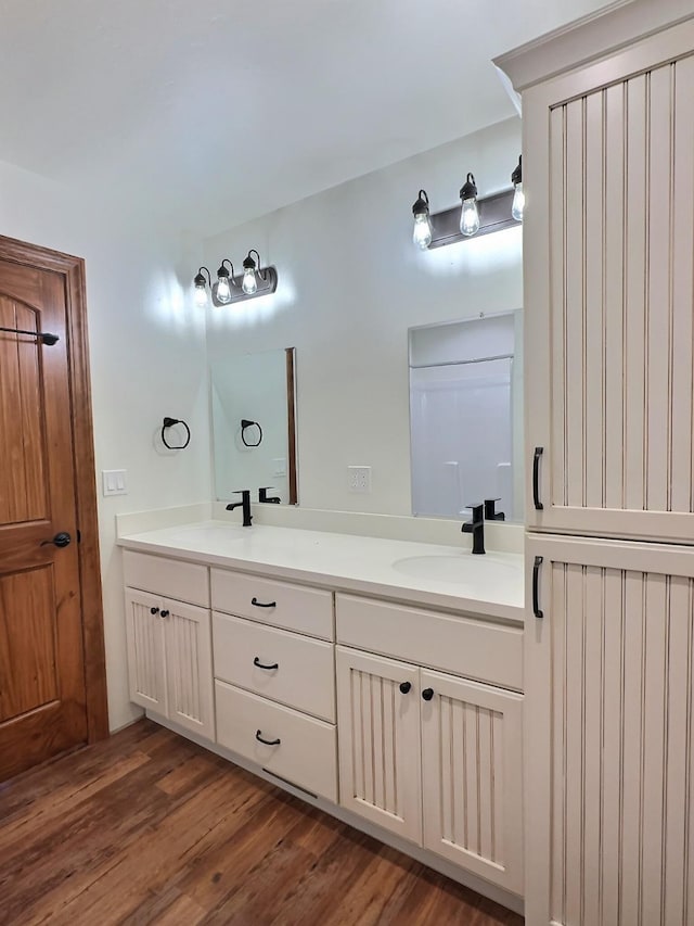 251 Elk Trl, Whitefish, MT 59937 - bathroom with double vanity and wood finished floors