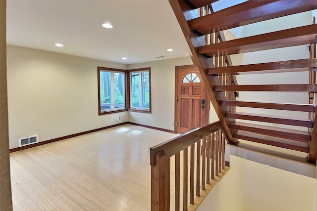 251 Elk Trl, Whitefish, MT 59937 - staircase featuring wood finished floors and recessed lighting