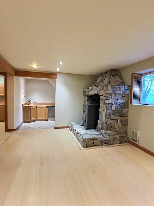 251 Elk Trl, Whitefish, MT 59937 - unfurnished living room with light wood-type flooring and recessed lighting