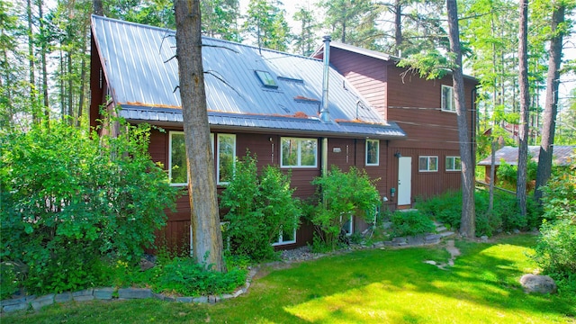 251 Elk Trl, Whitefish, MT 59937 - view of home's exterior with a yard and a metal roof