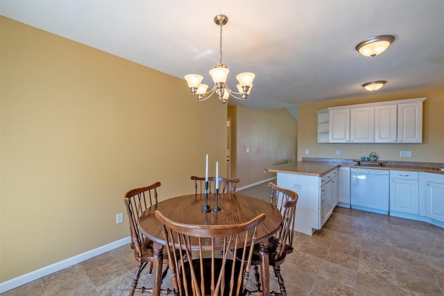 341 Northgate Loop, Helena, MT 59602 - dining room with a chandelier and baseboards