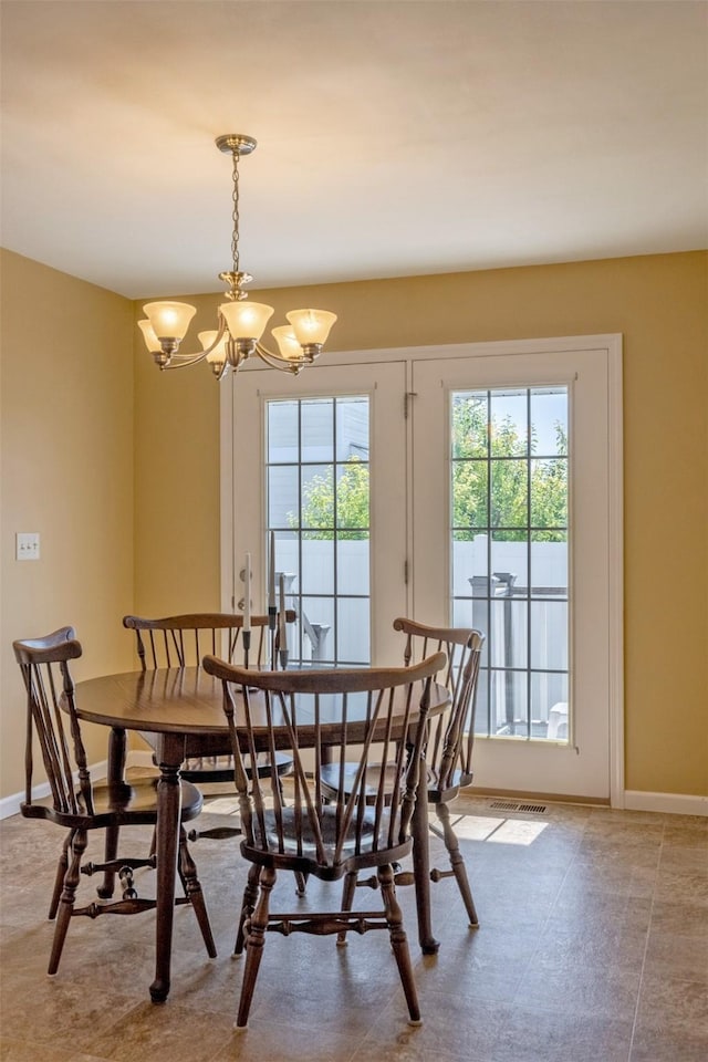 341 Northgate Loop, Helena, MT 59602 - dining space featuring a chandelier and baseboards