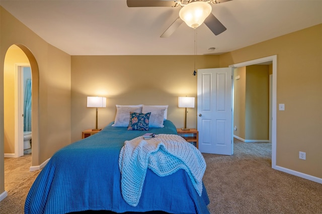 341 Northgate Loop, Helena, MT 59602 - bedroom with carpet, arched walkways, and ceiling fan