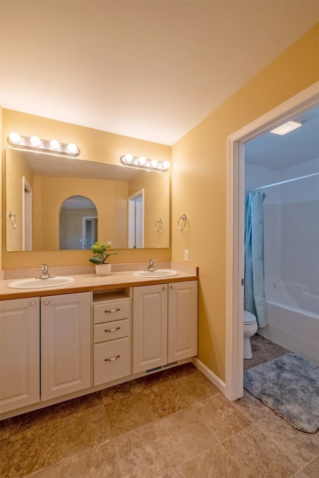 341 Northgate Loop, Helena, MT 59602 - bathroom with double vanity and shower / tub combo with curtain
