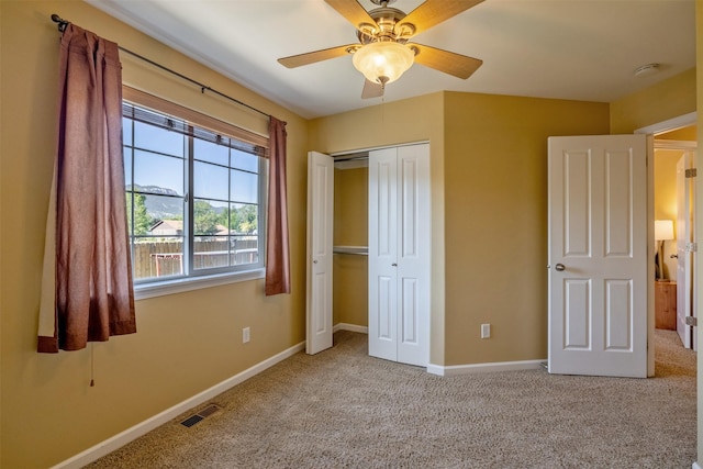341 Northgate Loop, Helena, MT 59602 - unfurnished bedroom featuring carpet, a closet, and ceiling fan
