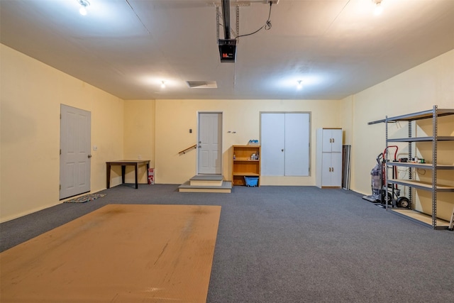 341 Northgate Loop, Helena, MT 59602 - garage featuring a garage door opener