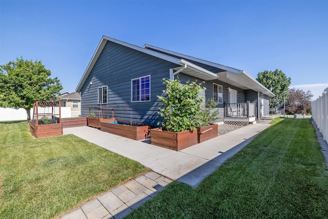 341 Northgate Loop, Helena, MT 59602 - view of home's exterior featuring a vegetable garden